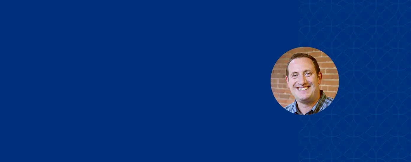 paul has a big smile and brown hair