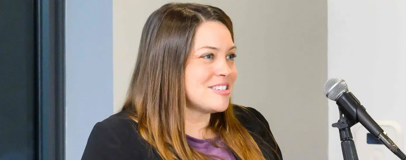 Woman speaking at podium