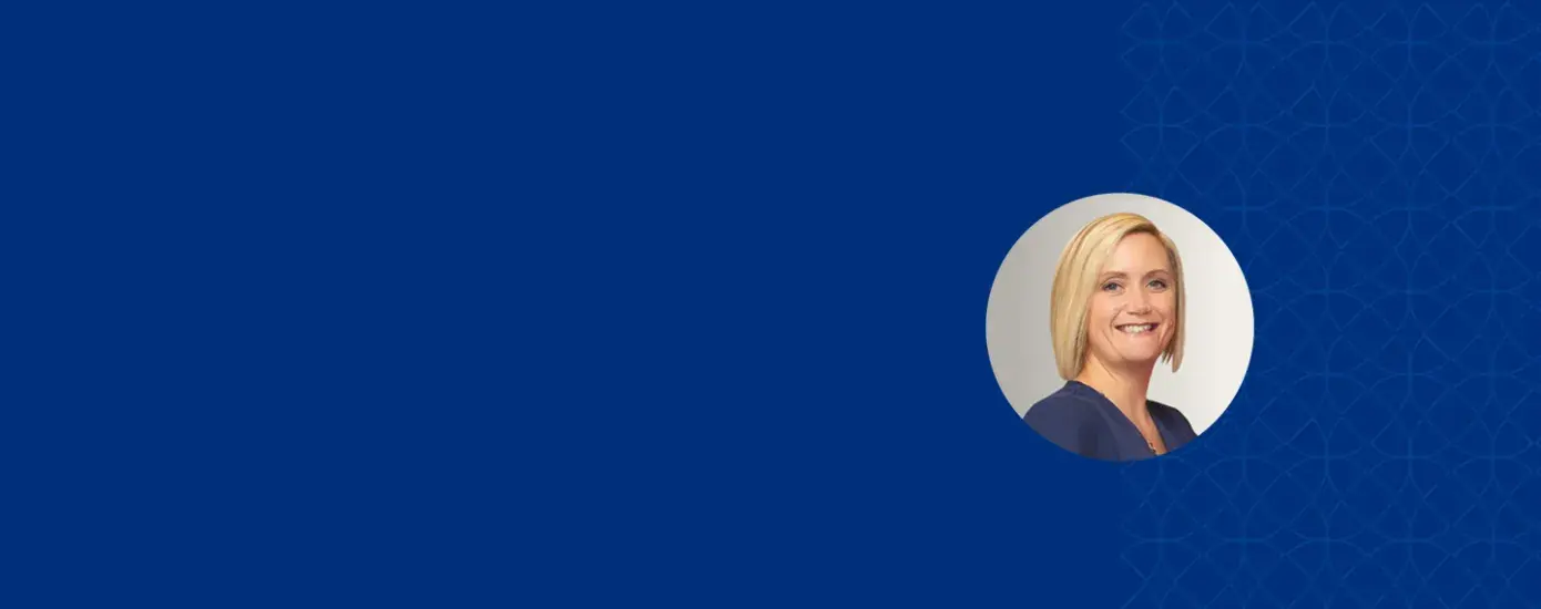 rosemary has short blond straight hair and a blue top