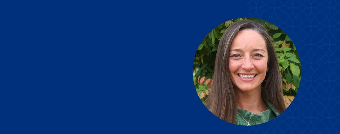 brenda is pictured in front of some trees