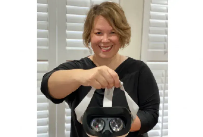 Rebecca Inzana with VR headset.