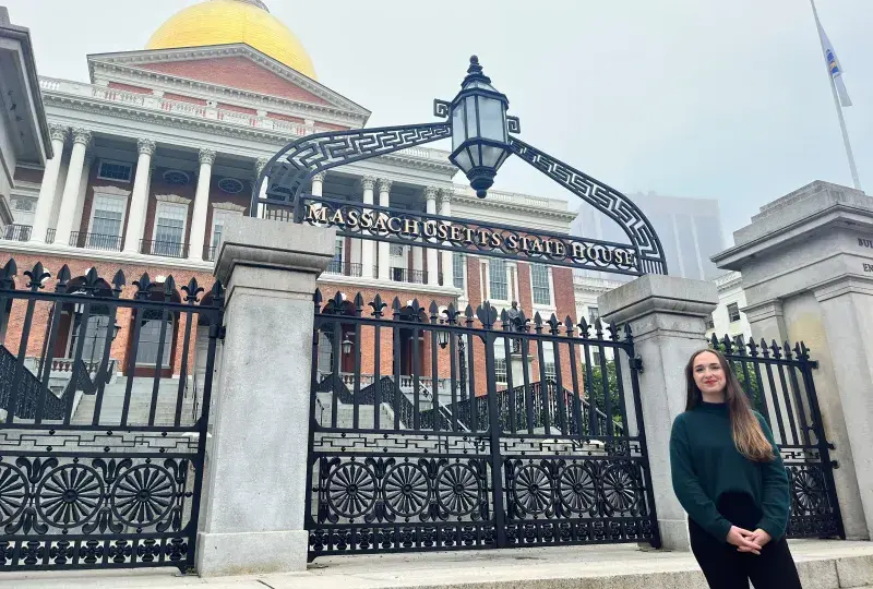 Mary O'Donnell stands in front of State House
