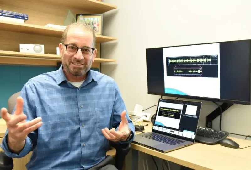 Man gesturing in an office