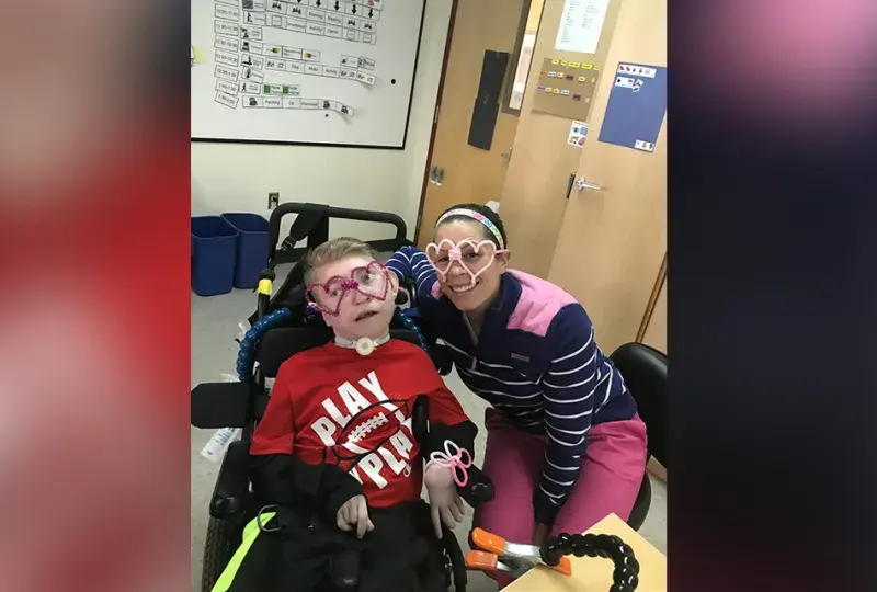 woman and boy in wheelchair