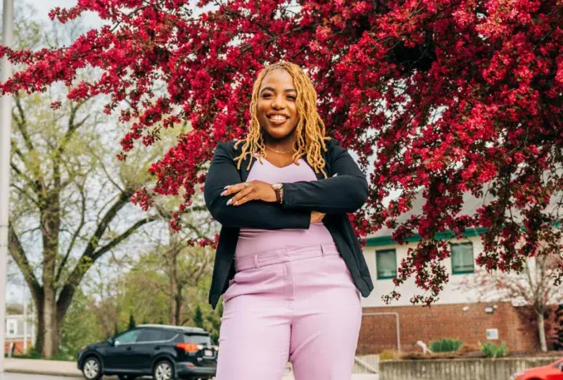 Woman standing and smiling