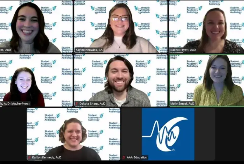 seven individuals on zoom screen