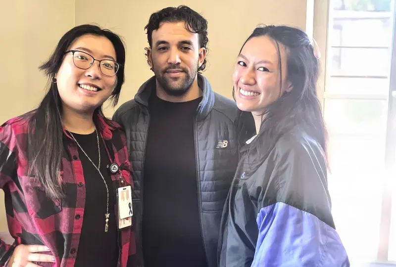 Doctor of Occupational Therapy students posing together during a group activity, showcasing camaraderie and teamwork.