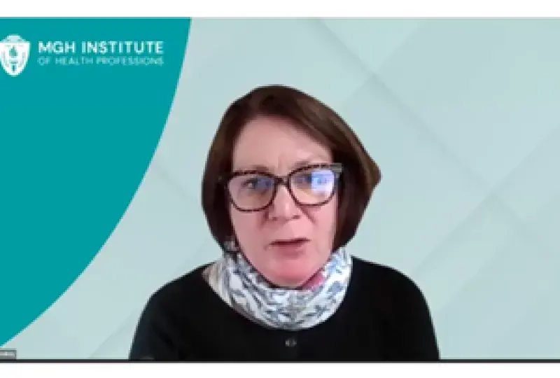 Woman in glasses talking on Zoom