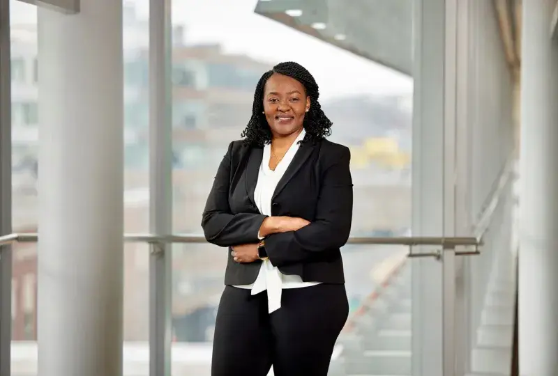 Confident professional in a suit representing leadership in speech language pathology