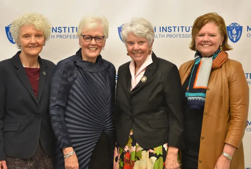 A photo of four women