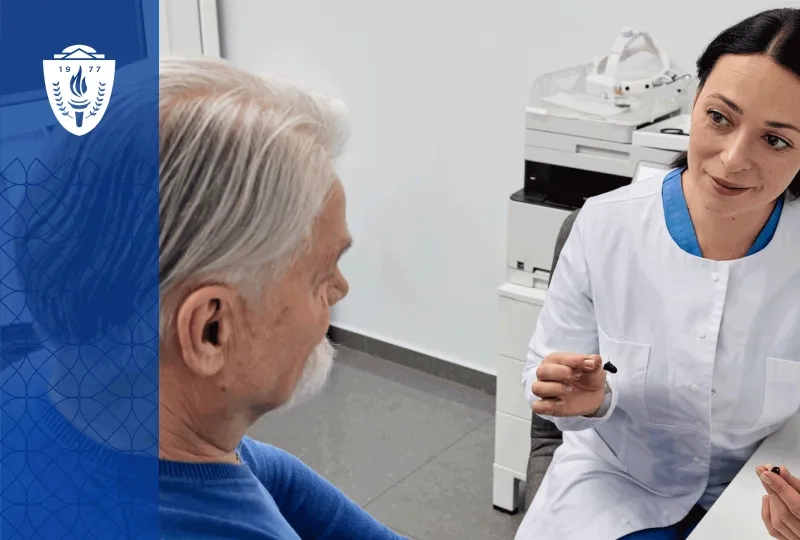 Audiology assistant explaining hearing aid features to an older adult patient