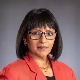 Subha Ramani in red blazer