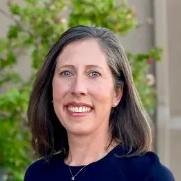 Outdoor headshot of a professor from the MGH IHP Doctor of Speech-Language Pathology program.