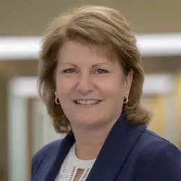 Janet Monagle in blue blazer