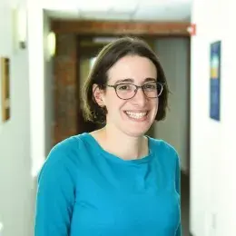 Rania Karim in blue shirt