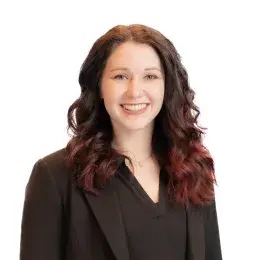 Headshot of a faculty member from the MGH IHP Doctor of Audiology program with a bright background.