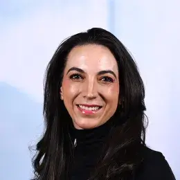 annie has dark hair and wears pink lip gloss