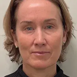 Traci Doherty in a black turtleneck