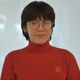 samantha has a red turtleneck on