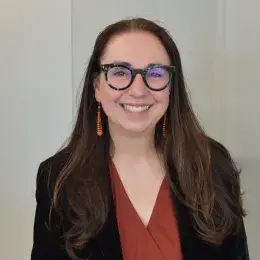 Headshot of a faculty member and researcher from the MGH IHP Master of Speech-Language Pathology program.