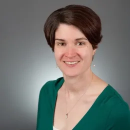 Ann Seman in green shirt