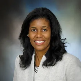 Professional headshot of woman in business attire