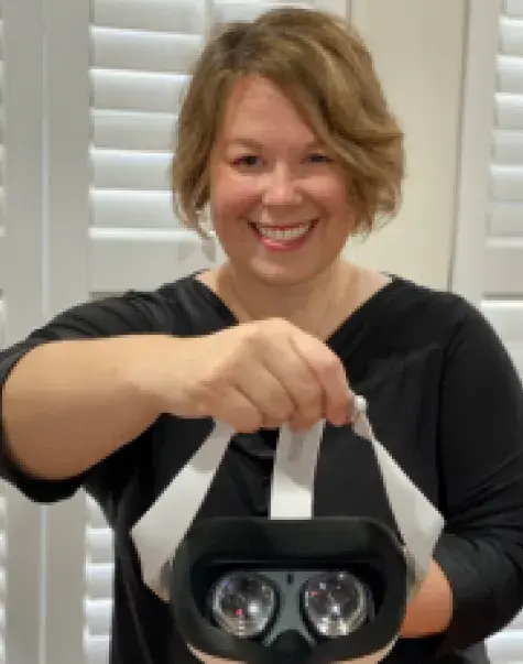 Rebecca Inzana with VR headset.