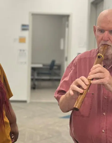 SLP student Simone Moss works with Aphasia Center client Leo Ross.