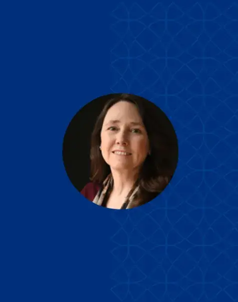 Photo of Cathy Leslie on a blue background