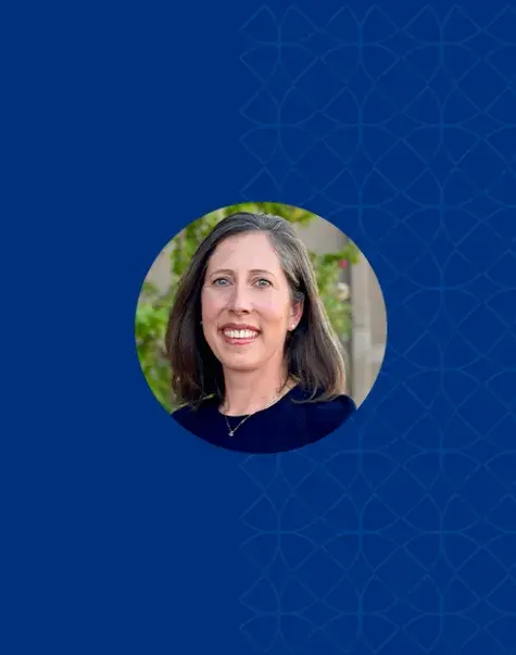 Photo of Megan Schliep on a blue background