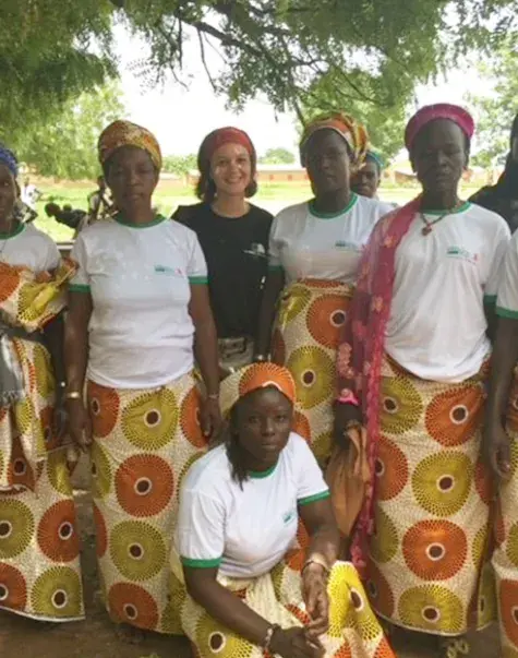 A group of community members and an educator involved in an international language development program supported by the MGH IHP Literacy and Language Certificate Program. This initiative is part of the program's commitment to promoting language acquisition techniques and intervention for reading difficulties in diverse populations.