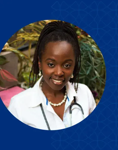 kamaria has glowing medium brown skin and wears a stethoscope 