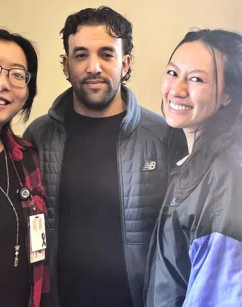 Doctor of Occupational Therapy students posing together during a group activity, showcasing camaraderie and teamwork.