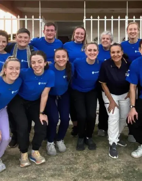 group of students posing outside of Guatemalan clinic 