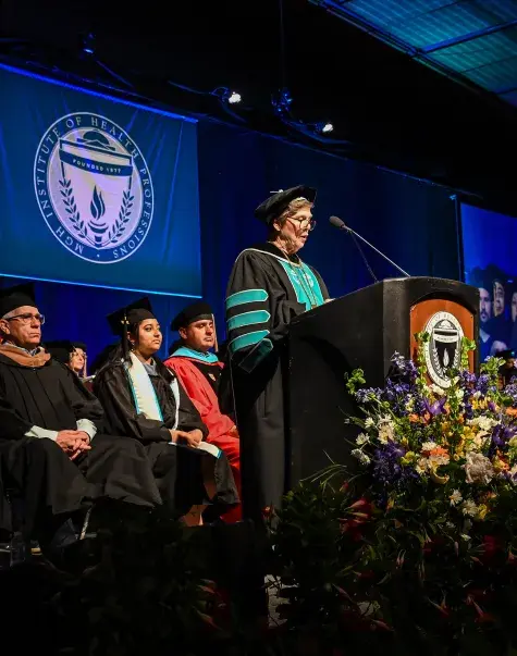 woman at commencement podium